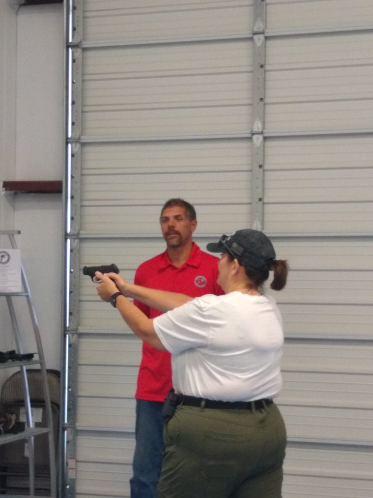 Practice dry fire drills in the Practical Pistol course